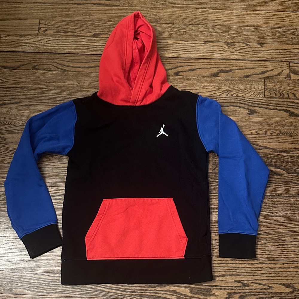 Nike Kids' Black Hoodie with Red and Blue Accents